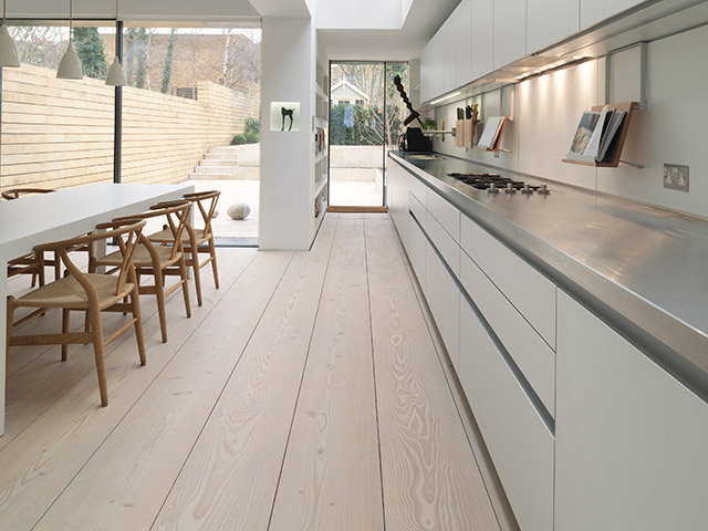 kitchen with large sustainable wooden flooring - grand designs