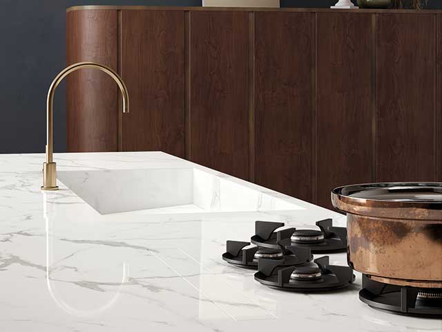 Porcelain kitchen worksurface with gold built-in tap 