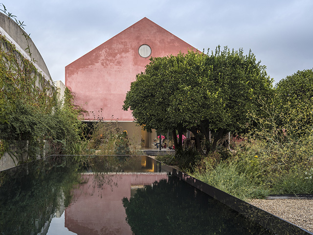 Portuguese winery conversion with red render facade - grand designs