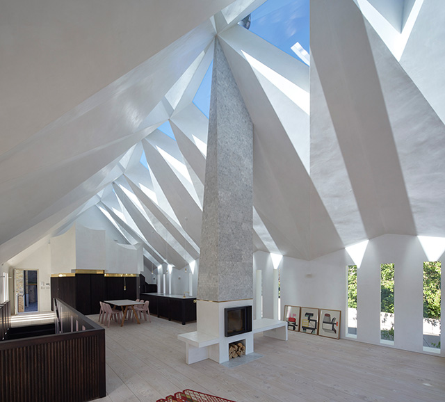 interior of chapel conversion with faceted ceiling- grand designs