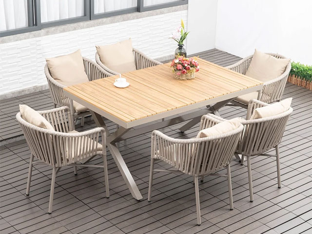 Homary outdoor dining set with woven Rattan armchairs. £1269 from ufurnish