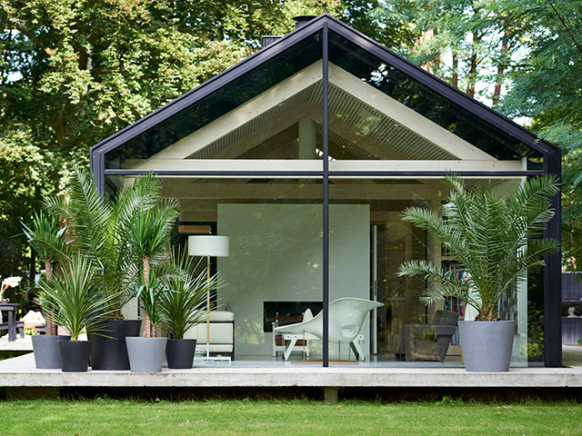 container gardening outside a modern outbuilding home - grand designs 