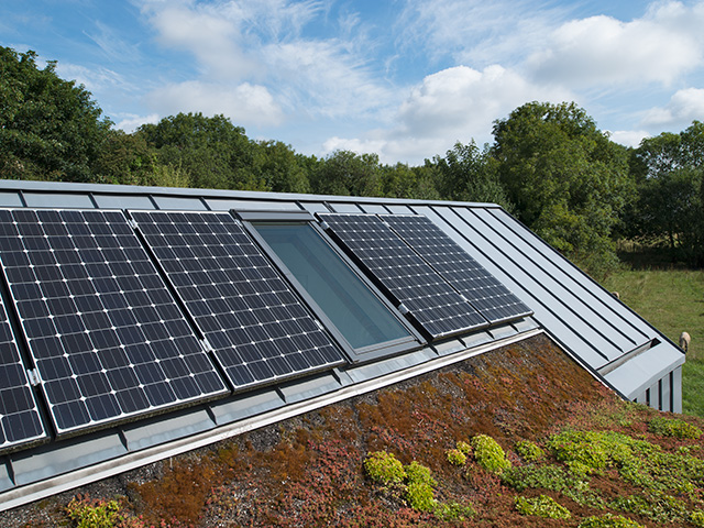 proctor shaw solar panels on green roof of house - grand designs 