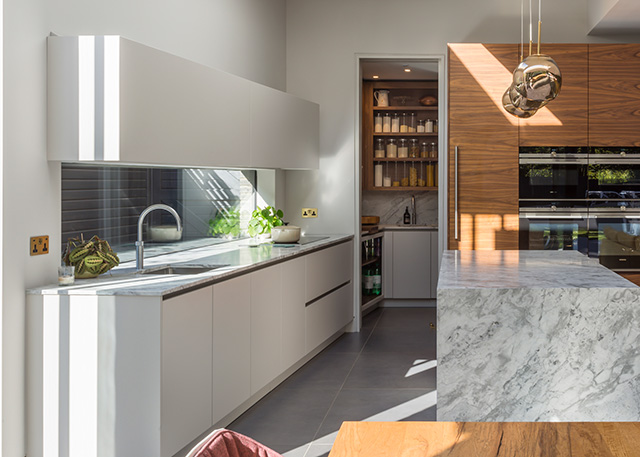 modern kitchen with window splashback - home improvements - grand designs