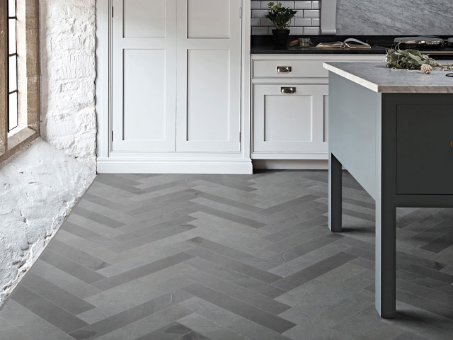 Slate Parquet Riven tiles in a country cottage kitchen with whitewashed stone walls