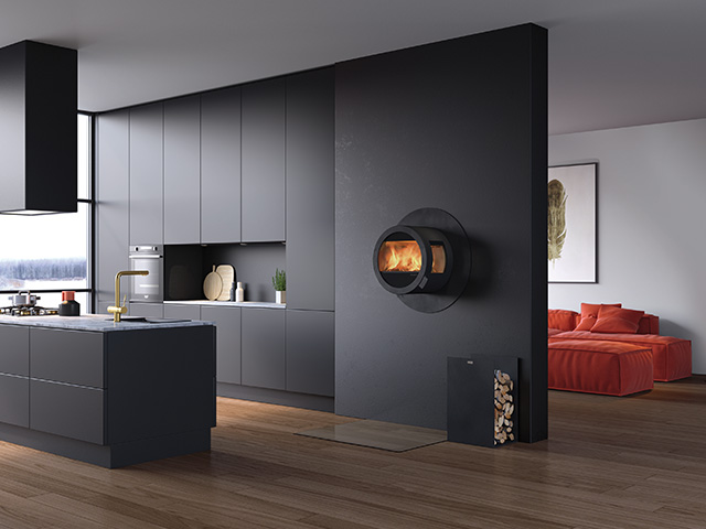 stove in kitchen - what type of heating to choose for your self-build project? - home improvements - granddesignsmagazine.com
