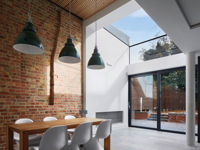 Mulroy Architects excavated the lower ground floor of this Edwardian house. The kitchen has a glazed roof. Photo: Will Pryce