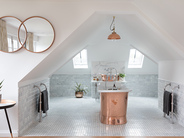 copper bath in loft conversion copy - what to consider when planning a bathroom renovation - home improvements - granddesignsmagazine.com