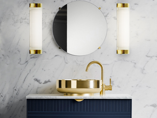 gold wall lights - what to consider when planning a bathroom renovation - home improvements - granddesignsmagazine.com