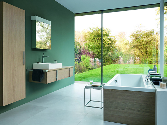 green bathroom bifold doors - what to consider when planning a bathroom renovation - home improvements - granddesignsmagazine.com