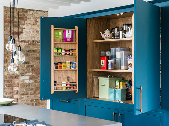 blue kitchen cabinetry with storage inside - home improvements - grand designs