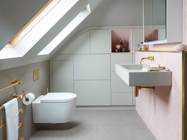 Built in bathroom cupboards painted in the same colour as the tiles makes a bathroom look bigger