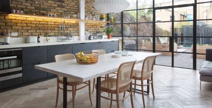 Kitchen extension with floor-to-ceiling Crittall windows by Martins Camisuli