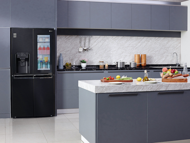 modern kitchen in grey with black fridge copy