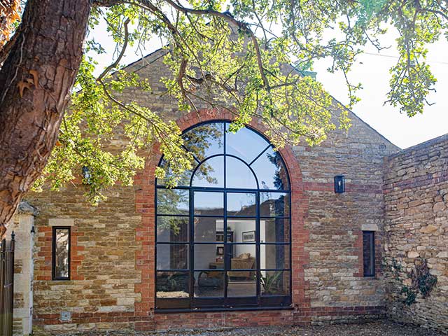 Crittall windows in old brickwork building
