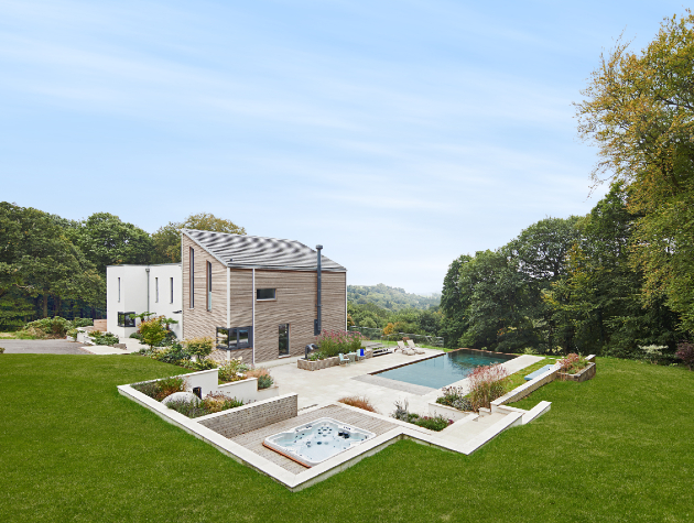 prefabricated house with swimming pool hot tub and gardens