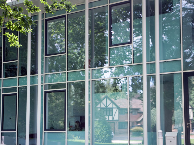 Advanced mirror film in the glazing reflects heat to keep the home cool in summer and warm in winter