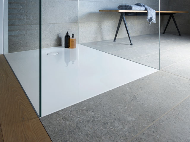 For a budget wet room look, install a low-level or flush fitting shower tray like this one from Duravit