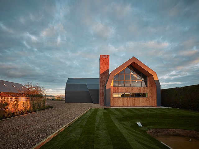 Should I install a heat pump now? This open-plan house has a ground source heat pump