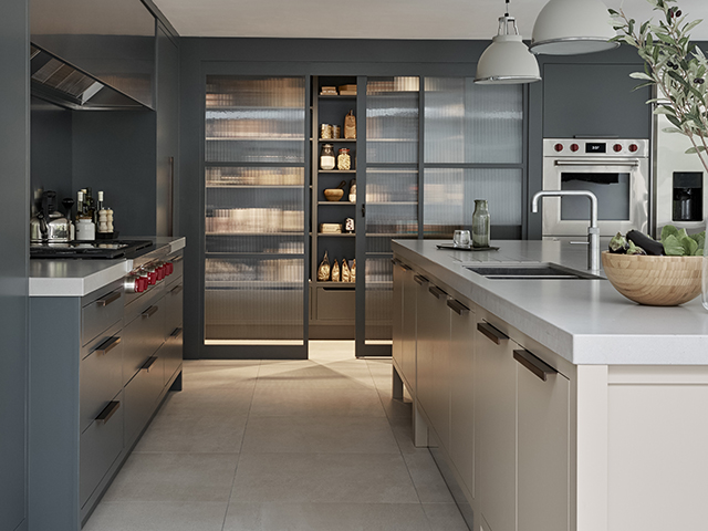 Kitchen storage ideas: This fluted glass walk-in larder by Mowlem & Co lets natural light into your panty