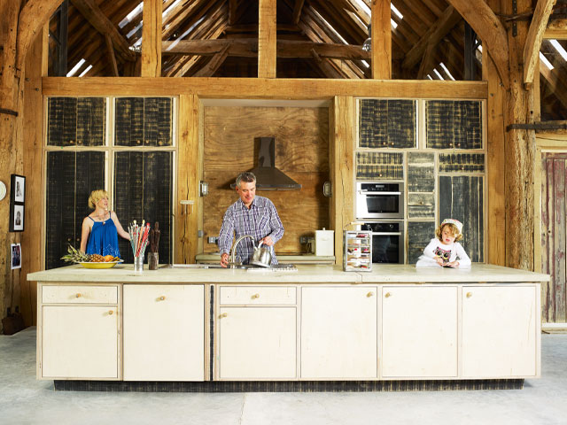 Inside the Essex barn conversion showing a huge open-plan living-kitchen-diner