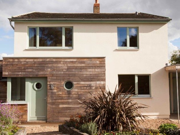triple glazing is worth it when retrofitting to enerphit standards: exterior of detached home with timber porch