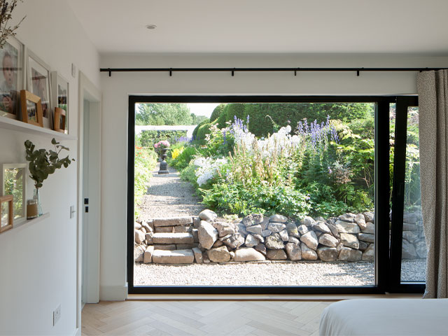 The Grand Designs SCottish bothy extension with view out to the formal gardens