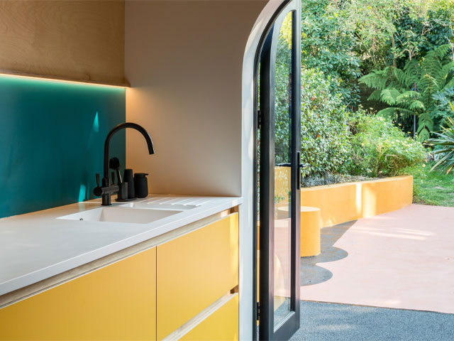 Alexander Owen Architecture created this colourful kitchen in a Victoria terrace house