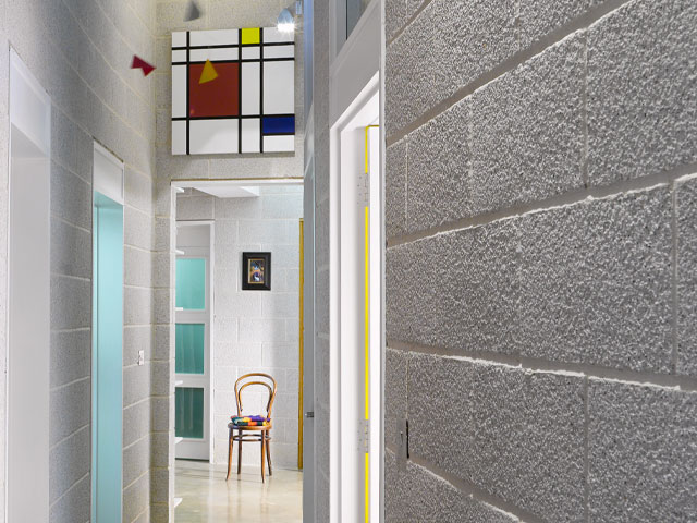 The Arc's curved corridor with Mondrian painting that Kevin McCloud was so fond of on Grand Designs