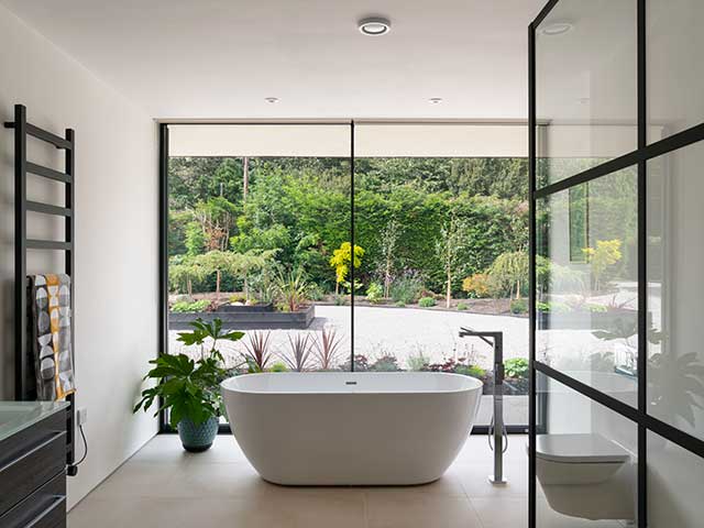 Freestanding bath and floor-mounted tap in bathroom of Grand Designs Malaysian pavilion