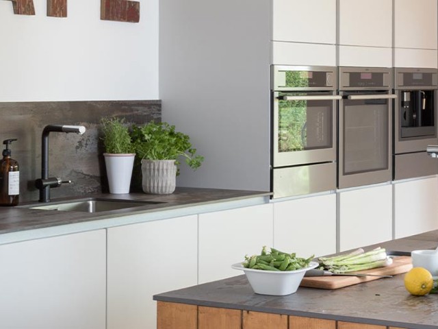 smaller kitchens can get the industrial look by sticking to neutral colours