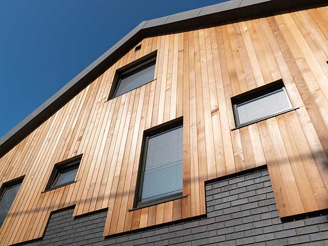 Side cladding and windows of Grand Designs Triangle house in West Sussex