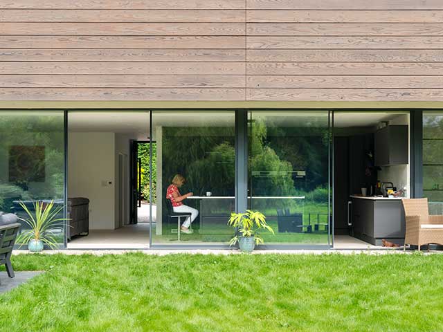 Courtyard area with clear doors in Malaysian-inspired Grand Designs pavilion