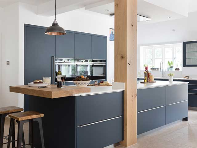 incorporate structural supports into your kitchen island for style and authenticity