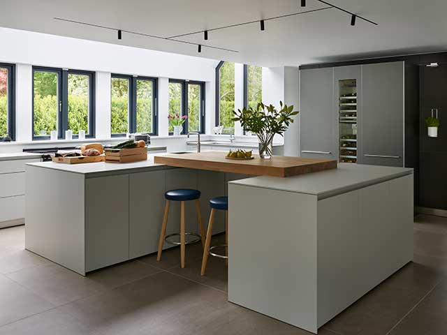 a split kitchen island can offer space for food prep at one end, storage at the other and a bridging breakfast bar