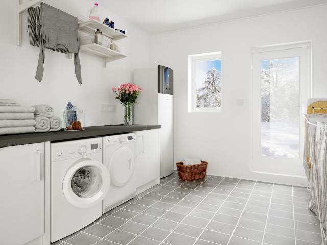 Daikin’s energy efficient air-source heat pump in a white modern utility room