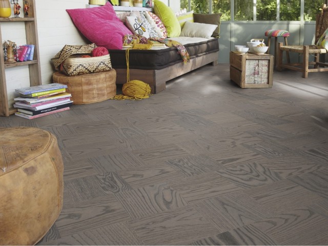 modern parquet flooring in a decorative herringbone pattern