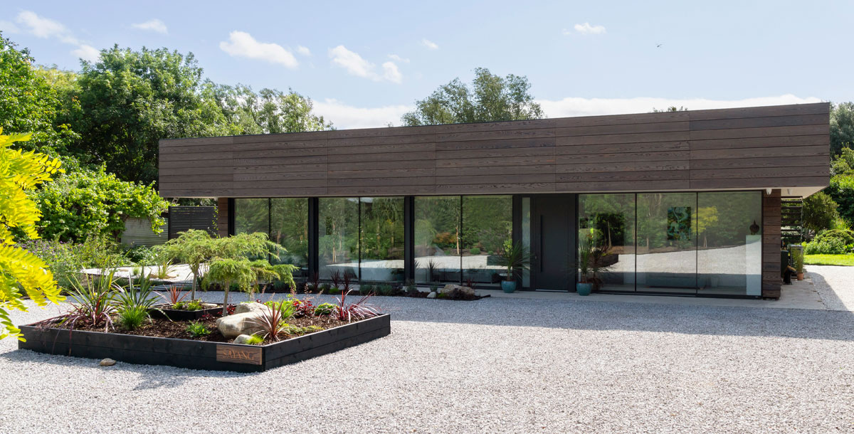 front timber clad houses