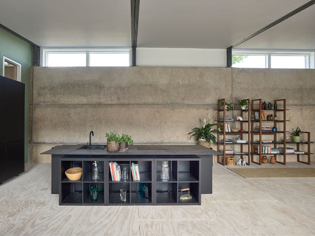 kitchen with concrete walls from the conversion