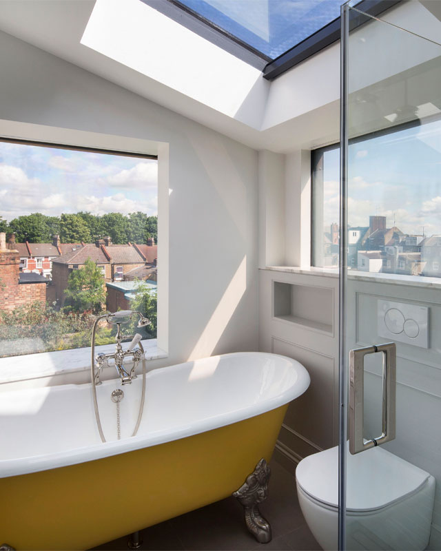 rooftop bathroom extension in London clad in black fibre cement panels