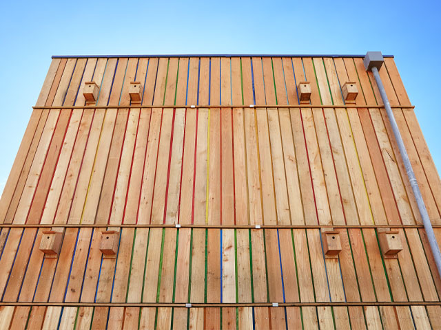 the exterior of the timber-framed SNUG Home a compact Passivhaus build