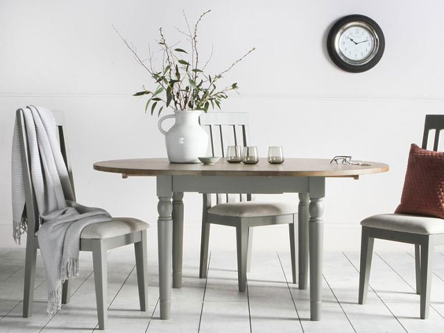Cooper oak round extendable dinner table from Perch & Parrow in neutral room