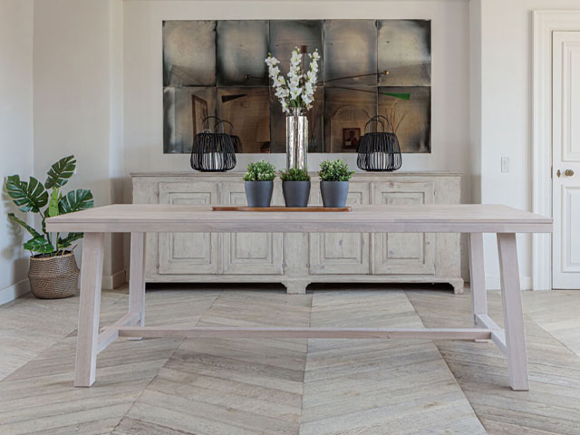 Kitsilano oak extending dining table in whitewashed solid oak in bright dining room
