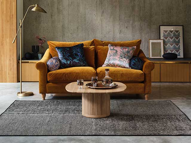 Devon two seater mustard sofa with scroll arm