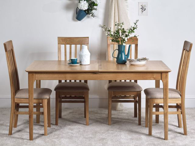 solid wood extendable dining table and chairs from Woods Furniture