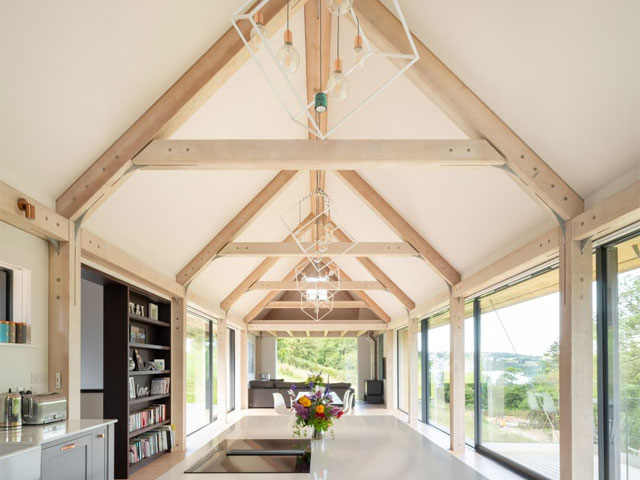 Open plan inside of Wood Awards winner with timber beams