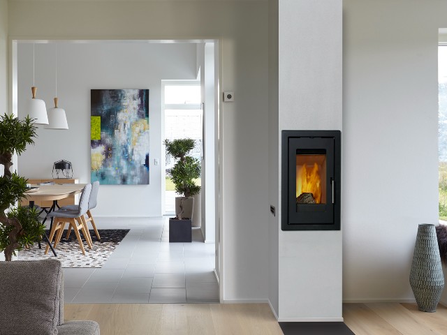 built in log burner in open-plan living and and dining room