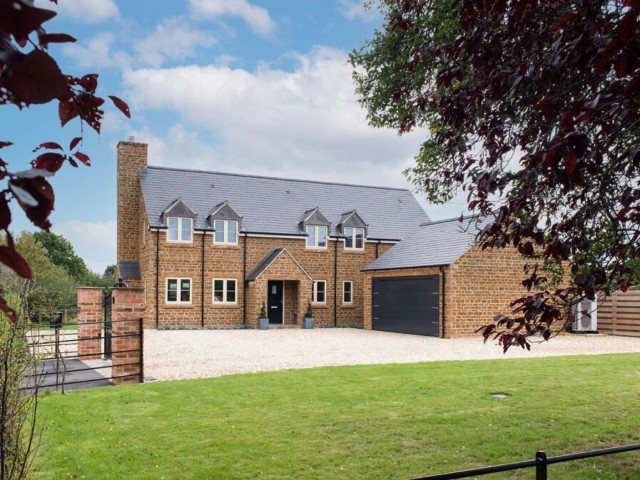 a remodelled large detached home with double garage and gravel drive