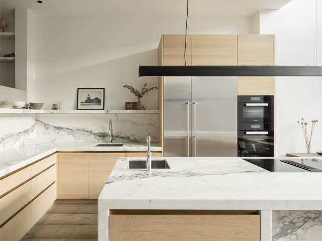 modern Scandi-style kitchen with large kitchen island and lots of natural light