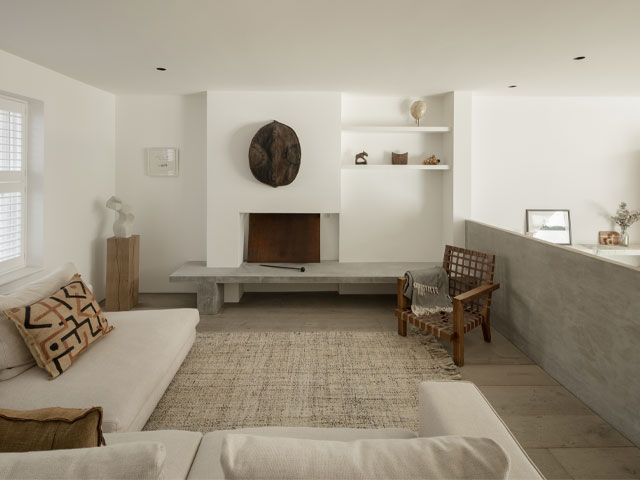 mezzanine living room in a modern new Corten steel and glass extension